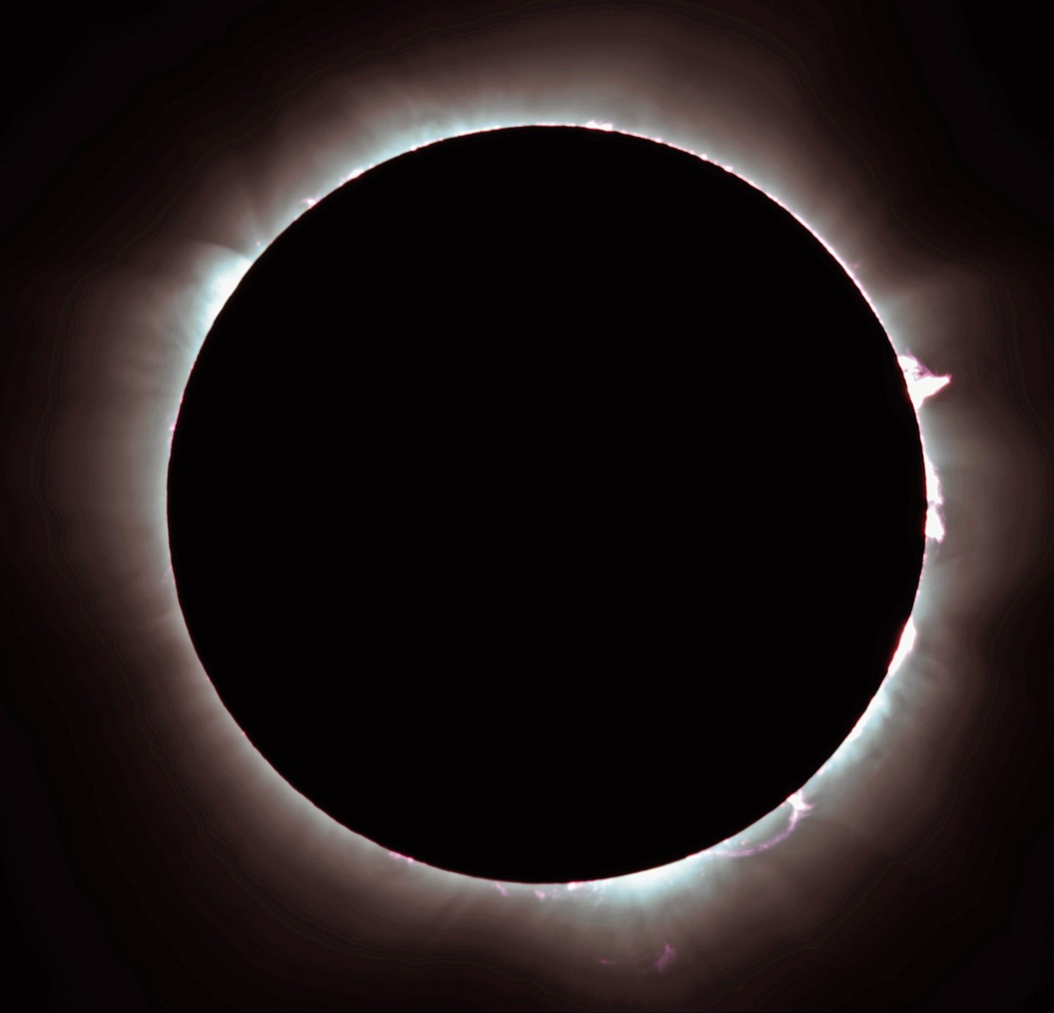 Totale Sonnenfinsternis in Exmouth, Australien. Nur während einer totalen Sonnenfinsternis wird die Korona sichtbar. Die Korona ist die äusserste Schicht der Sonnenatmosphäre, die sich oberhalb der Chromosphäre befindet und sich Millionen Kilomet Totale Sonnenfinsternis in Exmouth, Australien. Nur während einer totalen Sonnenfinsternis wird die Korona sichtbar. Die Korona ist die äusserste Schicht der Sonnenatmosphäre, die sich oberhalb der Chromosphäre befindet und sich Millionen Kilometer weit ins All erstreckt.